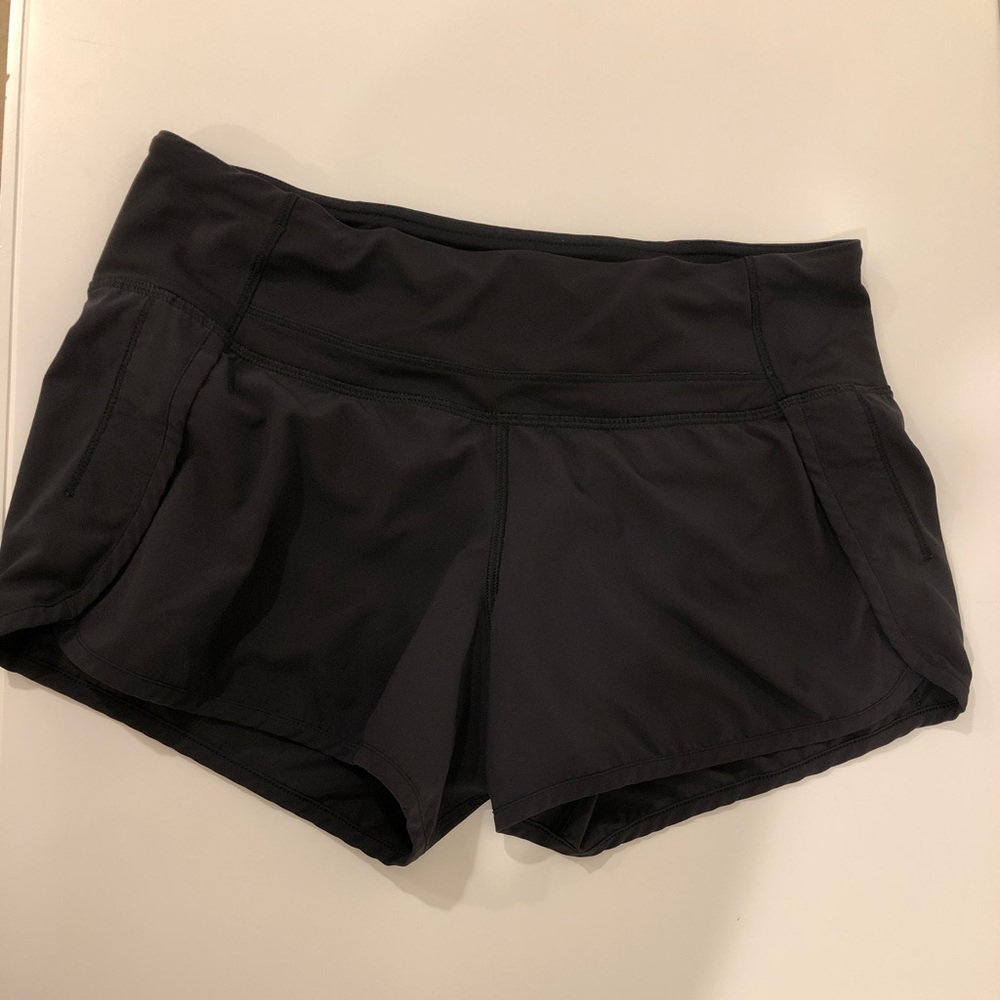 Lululemon black running shorts size 4.